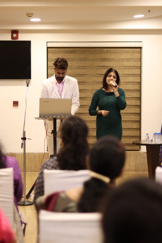 Business professionals presenting at a corporate event